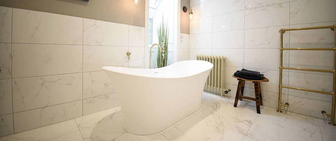 Our self catering accommodation suites contain luxury bathrooms with a bath and shower at our Portree accommodation Somerled House Suites