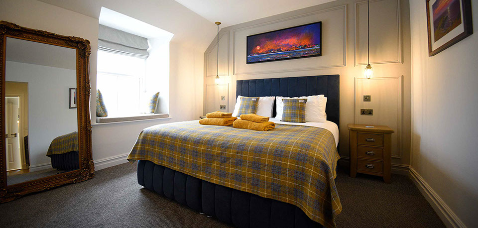 Somerled House Suites room 5 contains a King size bed with all bedding and linen provided at our Portree accommodation