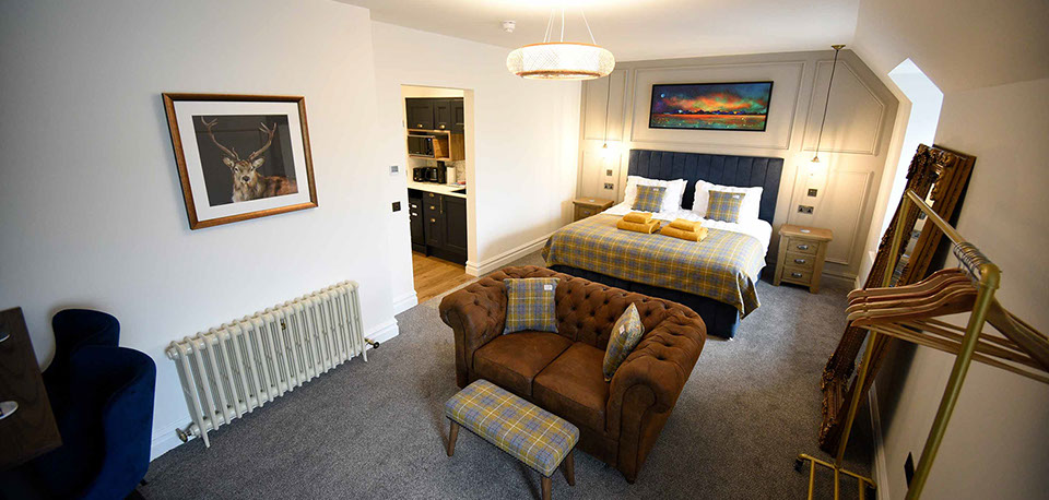 Somerled House Suites Room 4 contains a King size bed with WIFI internet at our Portree self catering accommodation