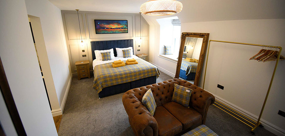 Somerled House Suites contain spacious rooms with King Size beds and cosy seating area at our self catering Portree accommodation