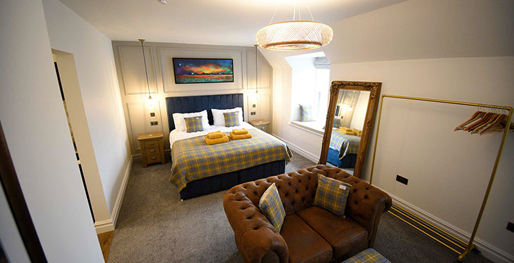 Somerled House Suites contain spacious rooms with King Size beds and cosy seating area at our self catering Portree accommodation
