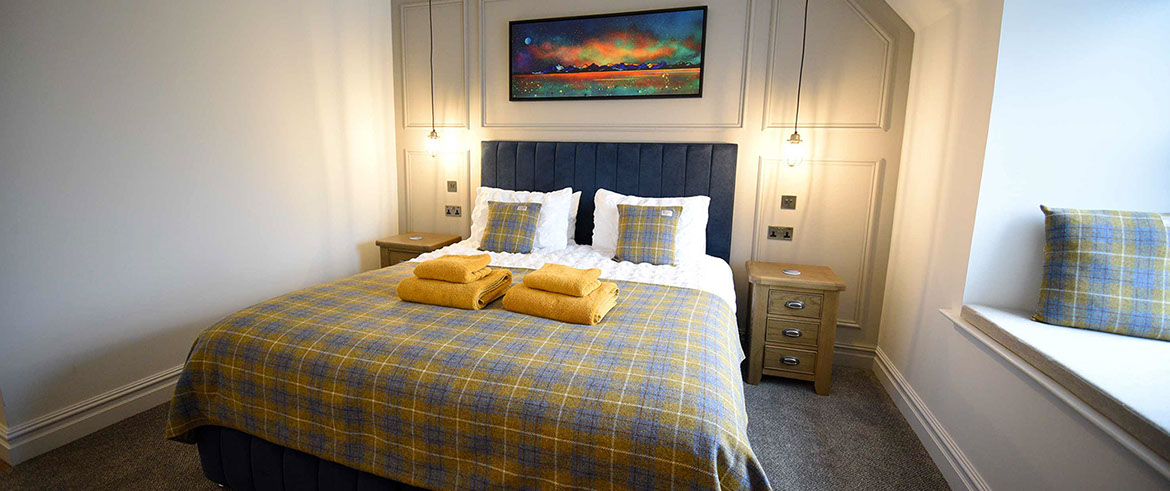 Somerled House Suites room 4 contains a King Size bed with all bedding and linen provided
