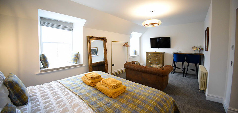 Somerled House Suites self catering accommodation contains King size beds with widescreen TV at our Portree accommodation